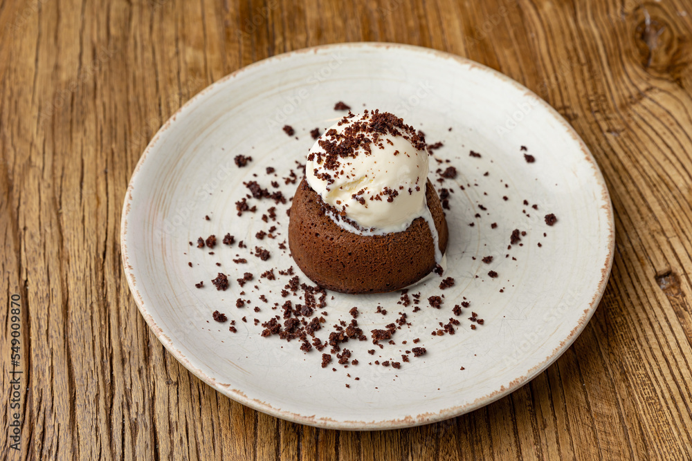 Fototapeta premium Tasting of chocolate fondant in restaurant.