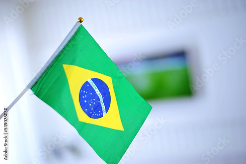 bandeira do brasil assistindo jogo mundial  photo