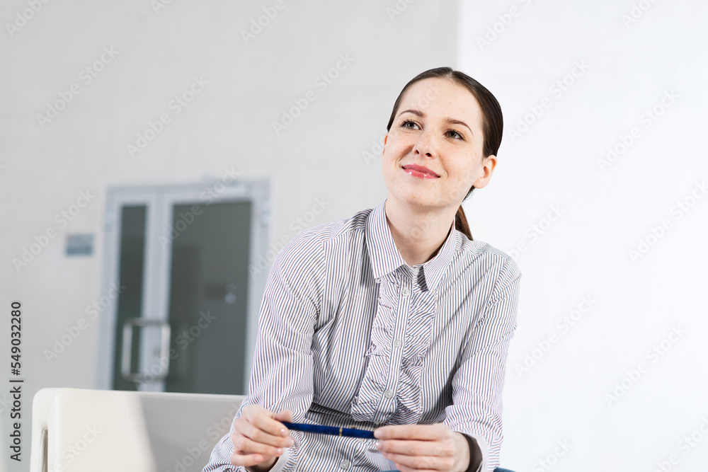 attractive young woman, cute and smiling attractive young woman, cute and smiling