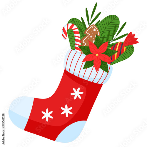 Christmas stocking with gifts. Candy cane, holly twig in red sock. 