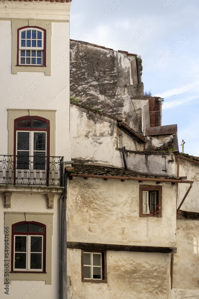 Old Coimbra street with white houses