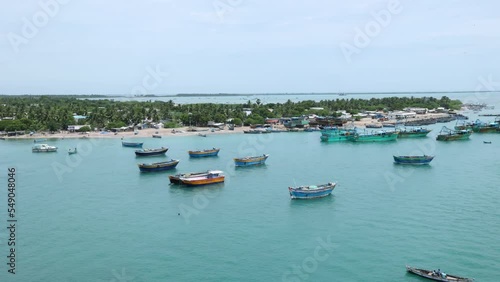 Many fishing boats in Indian harbor Pamban Island. Beautiful Beach of  Danushkodi, Rameswaram Tamil Nadu India Sri Lnaka. photo