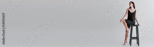 Full length of young woman with vitiligo posing near chair on grey background, banner.
