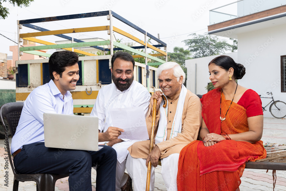 Indian family meeting financial advisor at village. Indian family meeting financial advisor at village.