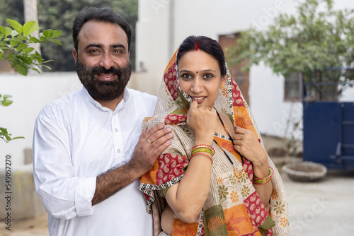 Portrait of Happy indian rural couple.