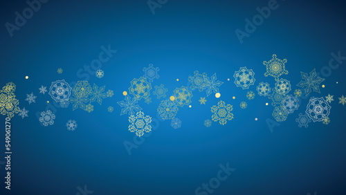 New Year frame with gold snowflakes on blue background. Horizontal Christmas and New Year frame for gift certificate, ads, banner, flyer, sales offers, event invitations. Glitter snow with sparkle