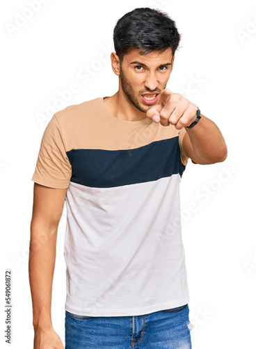 Young handsome man wearing casual clothes pointing displeased and frustrated to the camera, angry and furious with you