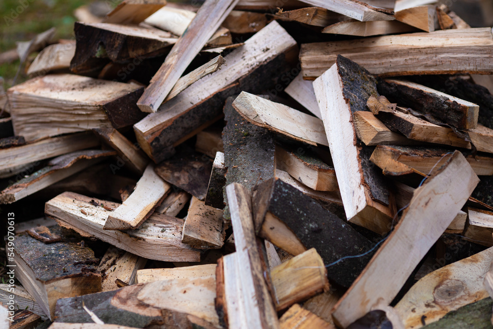 Pile of firewood logs - abstract texture background Pile of firewood logs - abstract texture background