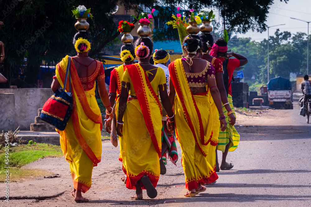 Black tribal women are going to celebrate their religious program in their traditional costume. Black tribal women are going to celebrate their religious program in their traditional costume.
