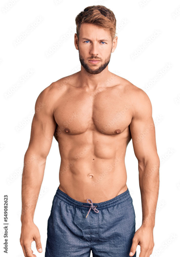 Young caucasian man standing shirtless depressed and worry for distress, crying angry and afraid. sad expression. Young caucasian man standing shirtless depressed and worry for distress, crying angry and afraid. sad expression.