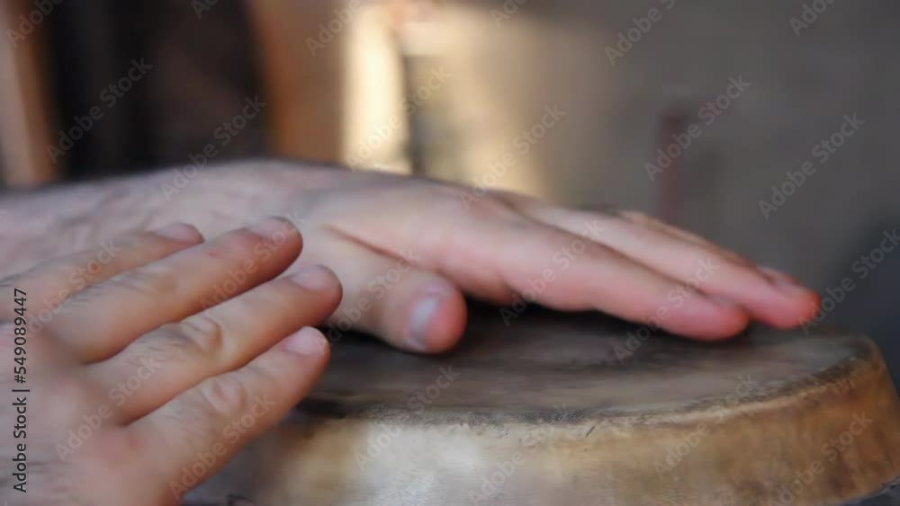 Hands of a Percussionist Playing a Drum. Close Up. 4K Resolution. Hands of a Percussionist Playing a Drum. Close Up. 4K Resolution.