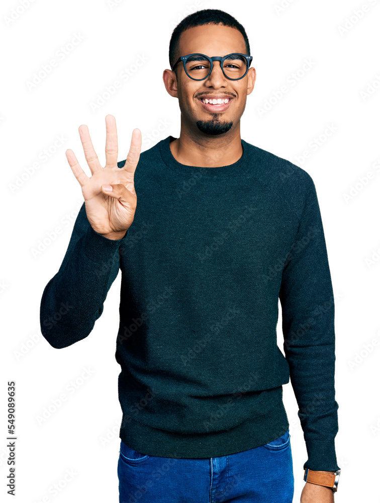Young african american man wearing casual clothes and glasses showing and pointing up with fingers number four while smiling confident and happy. Young african american man wearing casual clothes and glasses showing and pointing up with fingers number four while smiling confident and happy.