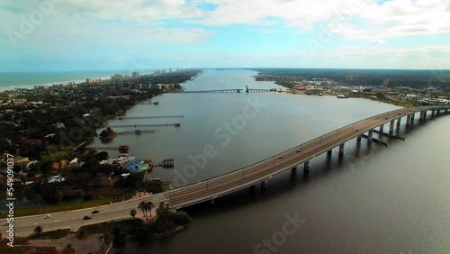 Wallpaper Mural Aerial Panning Shot Of Beautiful City With Cars Moving On Bridge Over Sea During Sunny Day - Daytona Beach, Florida Torontodigital.ca
