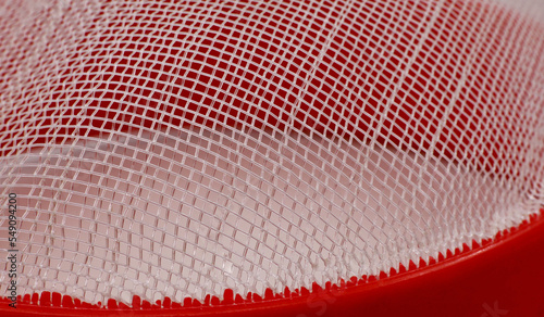 close-up plastic strainer detail. Domestic kitchen utensils