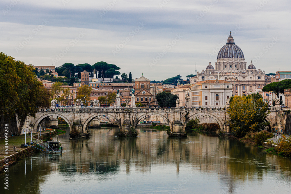 BRIDGE OVER THE RIVER TIBER AND THE DOME OF SAN PIETRO - ROME, ITALY