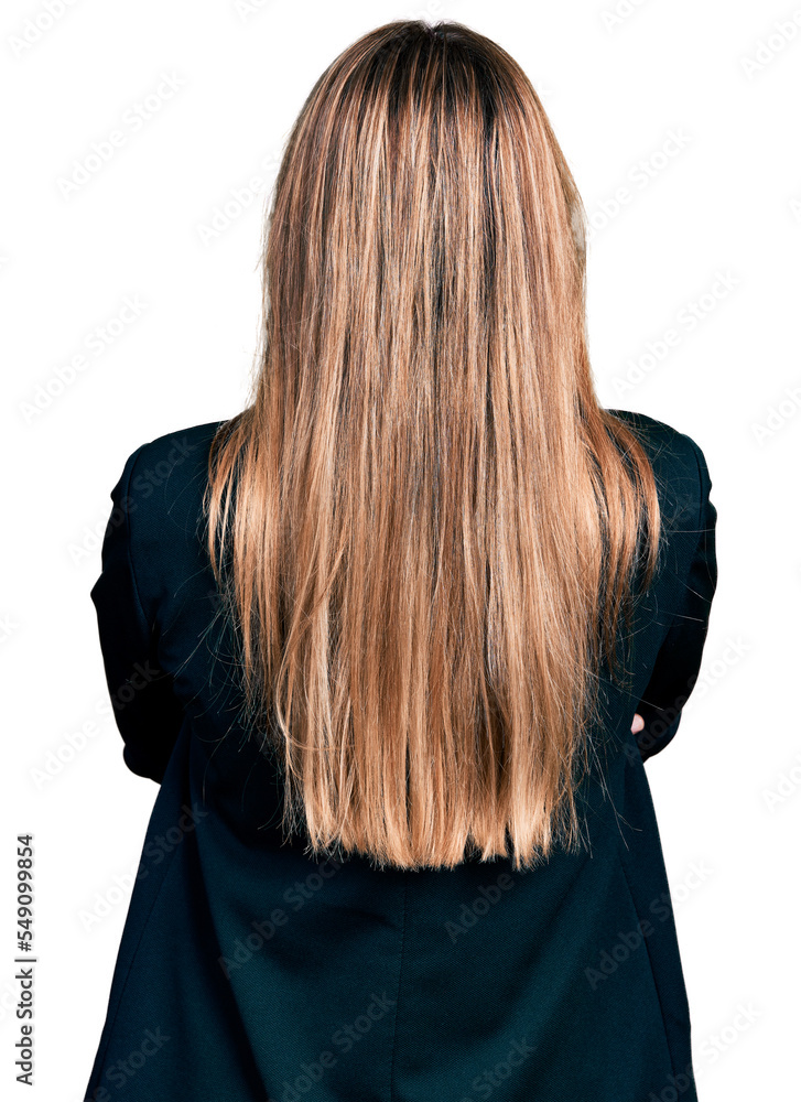 Naklejka premium Hispanic young woman wearing business jacket and glasses standing backwards looking away with crossed arms