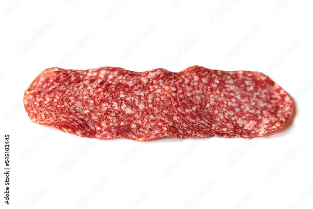 Thin sliced salami sausage isolated on white. Thin sliced italian dry salame Thin sliced salami sausage isolated on white. Thin sliced italian dry salame