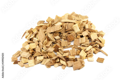 Wood chips for smocking isolated on white. Natural apricot wood smoking chunks