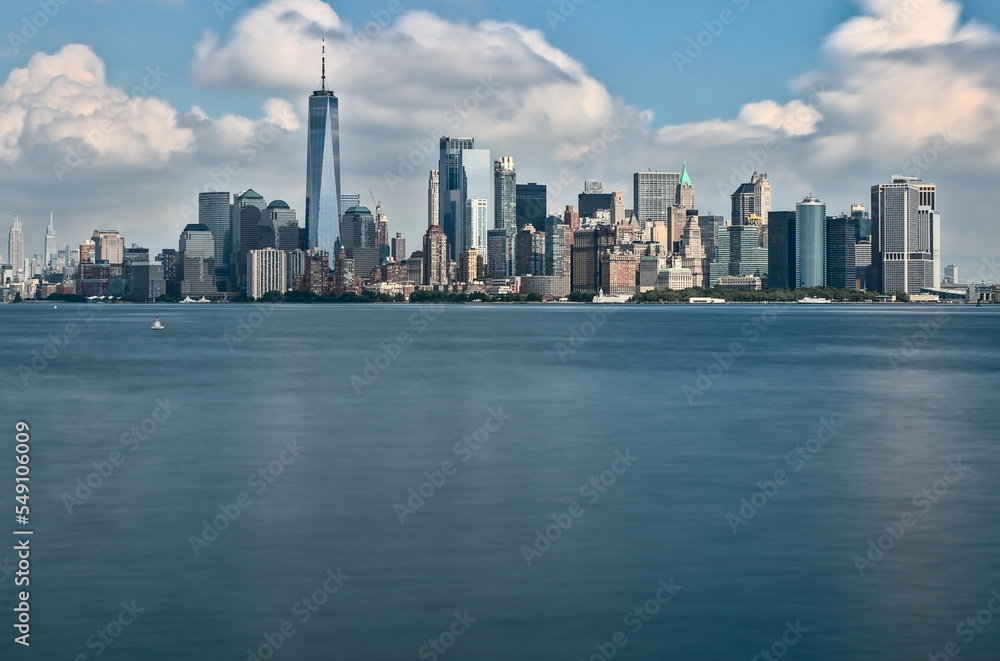 long exposure photography of the Manhattan skyline taken from the Liberty island