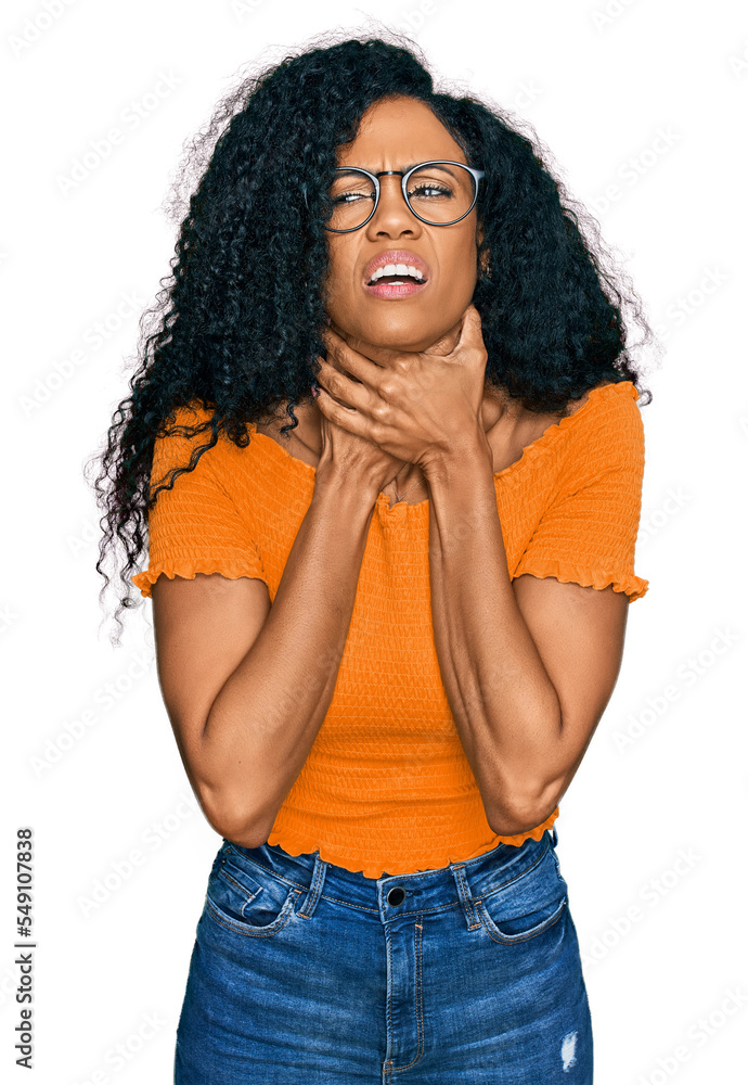 Middle age african american woman wearing casual clothes and glasses shouting and suffocate because painful strangle. health problem. asphyxiate and suicide concept. Middle age african american woman wearing casual clothes and glasses shouting and suffocate because painful strangle. health problem. asphyxiate and suicide concept.