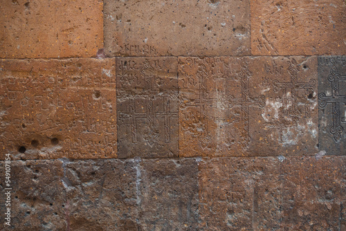 Ancient masonry made of Armenian red tuff. The texture of the wall.