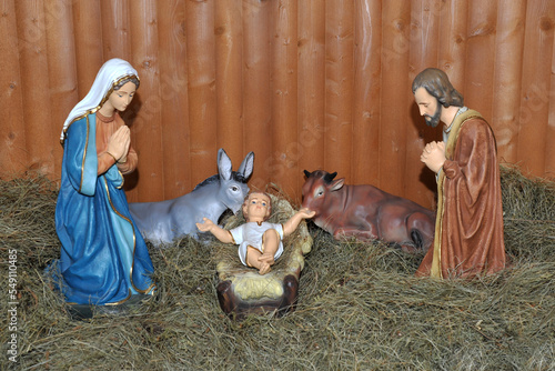 Traditional Christmas nativity scene with Mary and Joseph and baby Jesus in the manger.