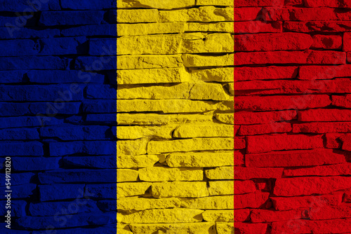 Flag of Romania on a textured background. Concept collage.