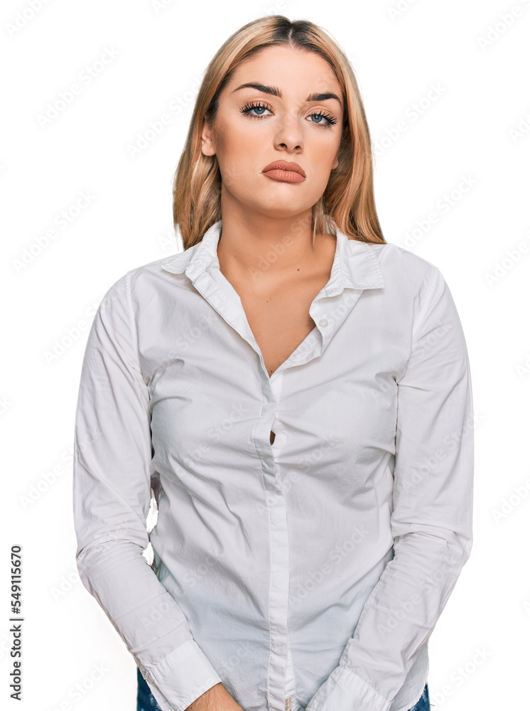 Young caucasian woman wearing casual clothes looking sleepy and tired, exhausted for fatigue and hangover, lazy eyes in the morning. Young caucasian woman wearing casual clothes looking sleepy and tired, exhausted for fatigue and hangover, lazy eyes in the morning.