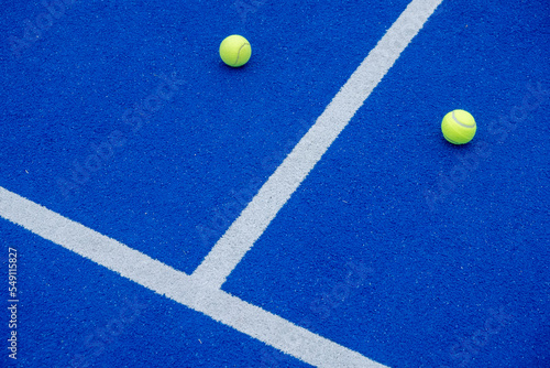 ball on a paddle tennis court with synthetic grass © Vic
