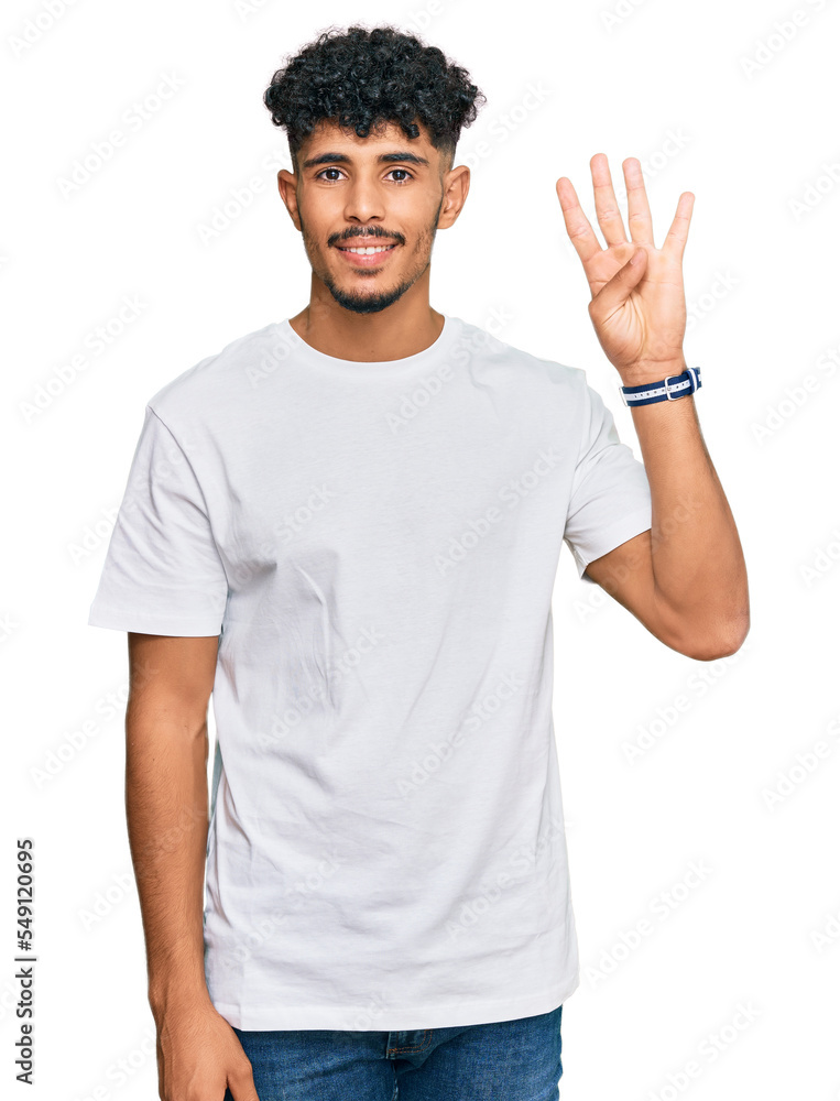 Young arab man wearing casual white t shirt showing and pointing up with fingers number four while smiling confident and happy. Young arab man wearing casual white t shirt showing and pointing up with fingers number four while smiling confident and happy.