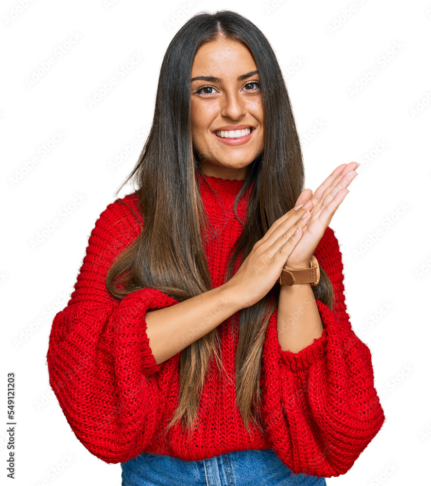 Beautiful hispanic woman wearing casual clothes clapping and applauding happy and joyful, smiling proud hands together Beautiful hispanic woman wearing casual clothes clapping and applauding happy and joyful, smiling proud hands together