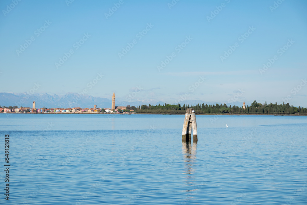 Obraz premium Burano view from Sant'Erasmo, with the Alps in the background