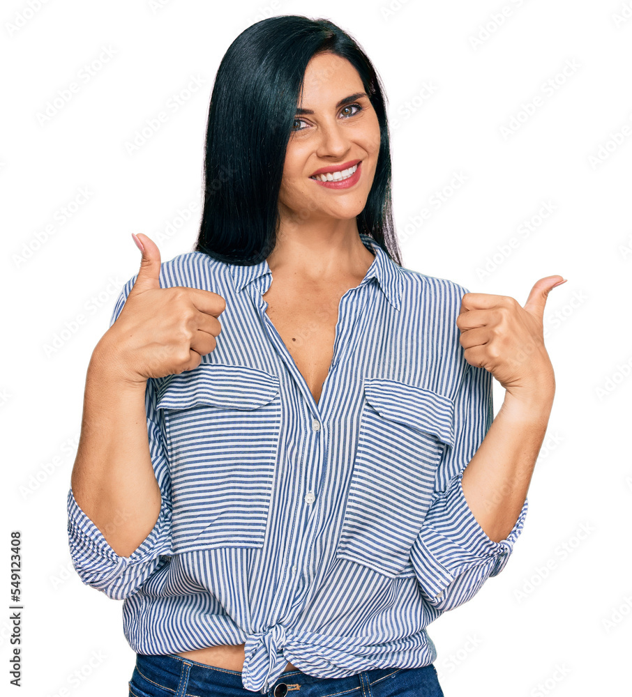 Young caucasian woman wearing casual clothes success sign doing positive gesture with hand, thumbs up smiling and happy. cheerful expression and winner gesture. Young caucasian woman wearing casual clothes success sign doing positive gesture with hand, thumbs up smiling and happy. cheerful expression and winner gesture.