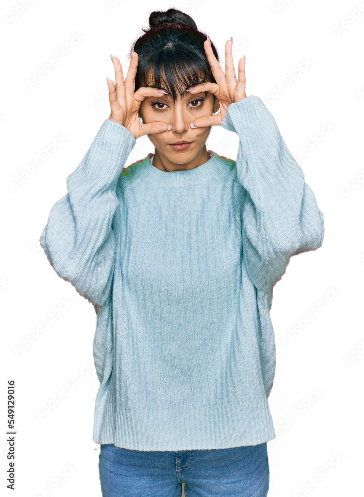 Young hispanic woman wearing casual clothes trying to open eyes with fingers, sleepy and tired for morning fatigue Young hispanic woman wearing casual clothes trying to open eyes with fingers, sleepy and tired for morning fatigue