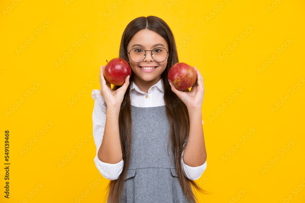 Teenager child girl biting tasty green apple. Happy girl face, positive and smiling emotions. Teenager child girl biting tasty green apple. Happy girl face, positive and smiling emotions.