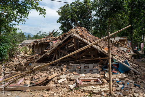 Homes were damaged triggered by the 5.6 magnitude earthquake that killed at least 271 people, with hundreds injured.