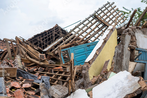 Homes were damaged triggered by the 5.6 magnitude earthquake that killed at least 271 people, with hundreds injured.