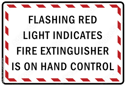 Fire emergency sign flashing red light indicates fire extinguisher is on hand control © middlenoodle
