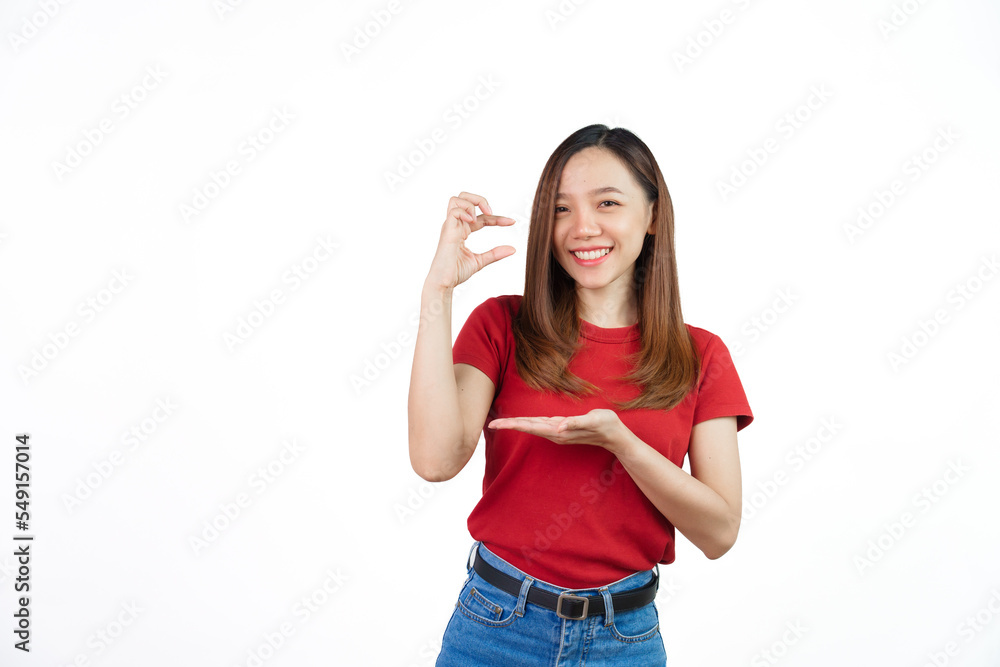 Pretend to hold small objects, Pretty Asian people wearing red t-shirt for a woman isolated on white background. Pretend to hold small objects, Pretty Asian people wearing red t-shirt for a woman isolated on white background.