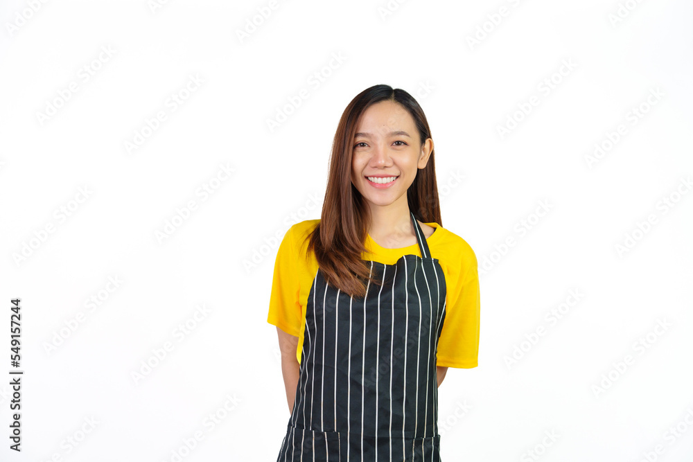 Looking to camera, Portrait of confident asian woman barista and food owner shop with yellow t-shirt and black apron standing on white background. Looking to camera, Portrait of confident asian woman barista and food owner shop with yellow t-shirt and black apron standing on white background.