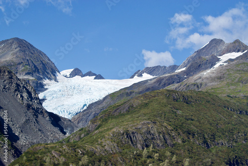 glacier in a valley on a mountain in Alaska