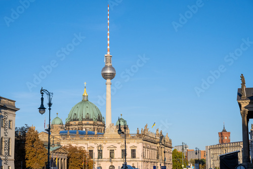 Fotografia, Obraz The famous TV Tower and some historic buildings at the Unter den Linden boulevar