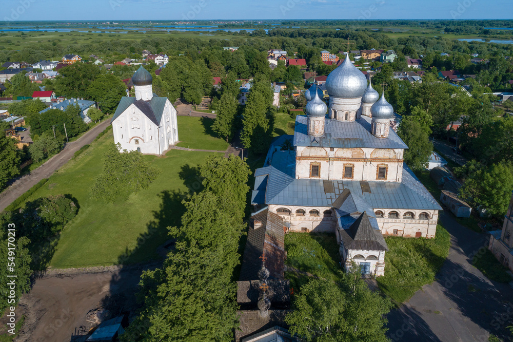 Ancient Cathedral of the Sign and the Church of the Transfiguration of the Savior in a summer cityscape (aerial view). Veliky Novgorod, Russia