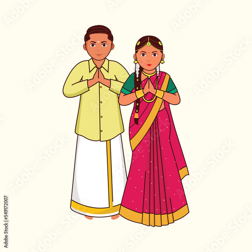 South Indian (Tamil Nadu) Wedding Couple Greeting Namaste In Traditional Dress Against Cosmic Latte Background.