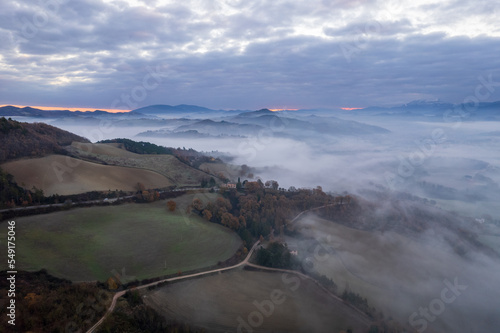 Aerial view of foggy morning in Marche region in Italy