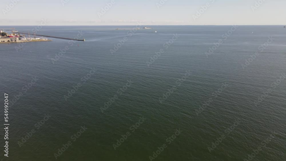 Aerial view of the breakwater over the Baltic Sea in the port of Gdynia on a sunny,autumn day. Aerial view of the breakwater over the Baltic Sea in the port of Gdynia on a sunny,autumn day.