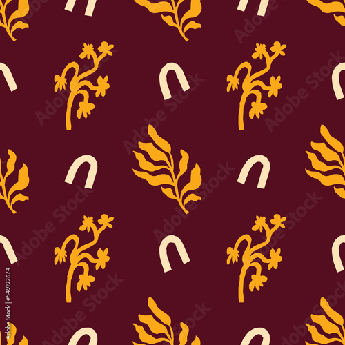 Bright brown and yellow vector seamless pattern with leaves. For prints, backgrounds, wrapping paper, textile, linen, wallpaper, etc.