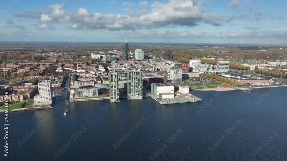 Almere medium large dutch city in province of Flevoland, The Netherlands, Skyline downtown city center, Almere Stad center, city build below sea level, Infrastructure and urban aerial view. Almere medium large dutch city in province of Flevoland, The Netherlands, Skyline downtown city center, Almere Stad center, city build below sea level, Infrastructure and urban aerial view.