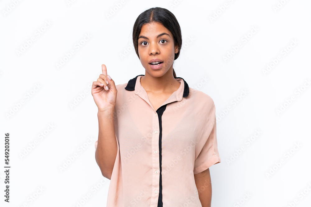 Young African american woman isolated on white background thinking an idea pointing the finger up Young African american woman isolated on white background thinking an idea pointing the finger up