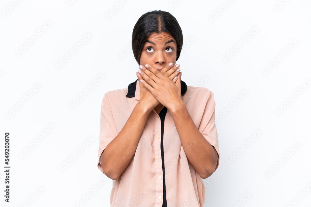 Young African american woman isolated on white background covering mouth with hands Young African american woman isolated on white background covering mouth with hands